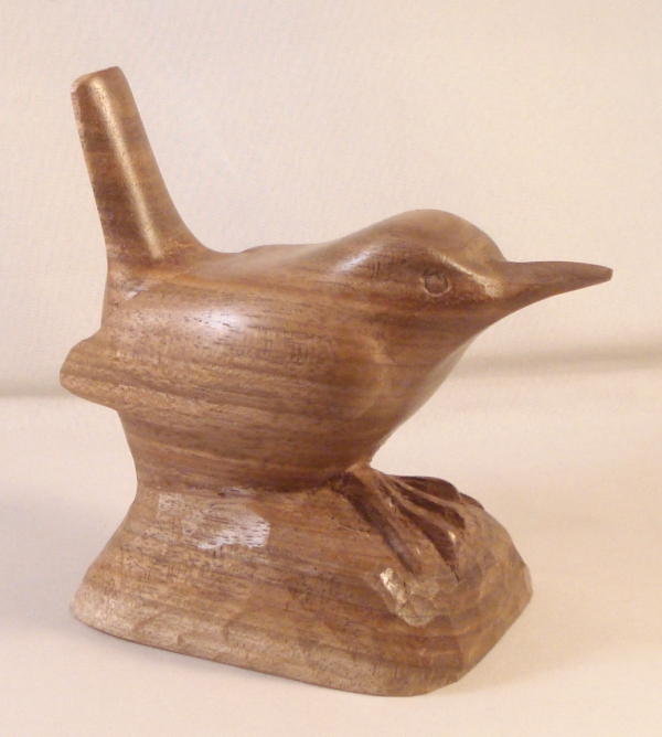 Ralph Williams Wood Carving: Jenny Wren carved out of one piece of Walnut sitting on a rock available online here